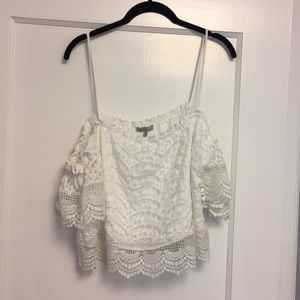 White embroidered off the shoulder strapless shirt